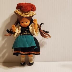 Vintage wind up doll in Greek traditional outfit. 7"